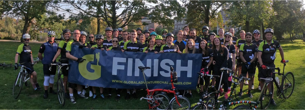 racers with the bikes on the finish line